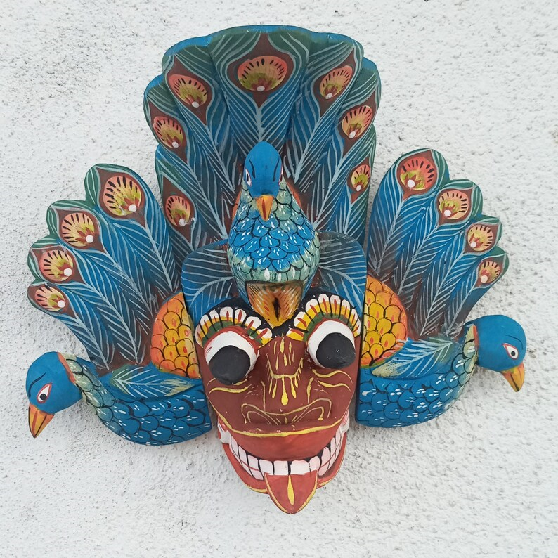Stunning Peacock Mask Sculpture